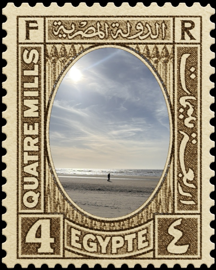 Lone figure on a beach, framed inside an Egypt 4 Mils vintage stamp